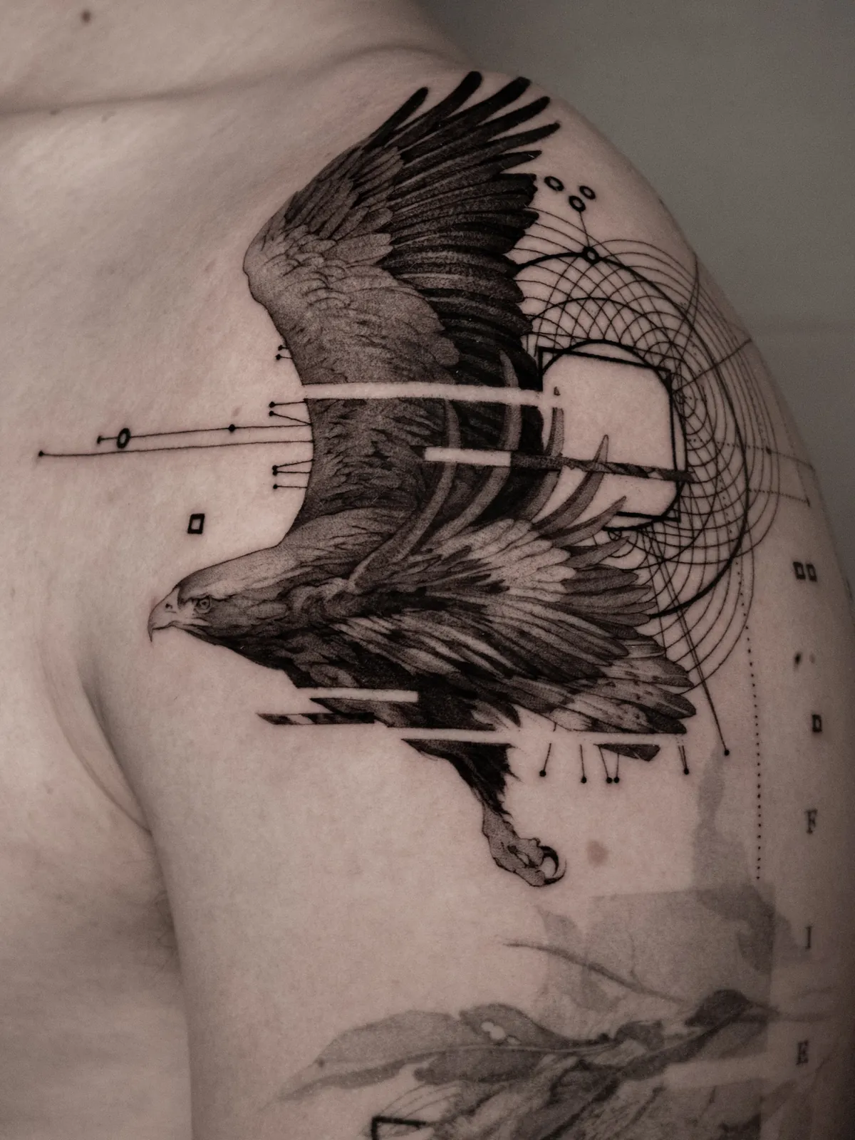 Eagle & Geometry — tattoo by Ted Faulmann